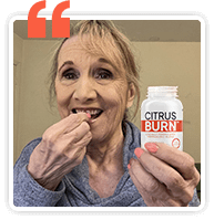 CitrusBurn customer taking a CitrusBurn capsule while holding the bottle